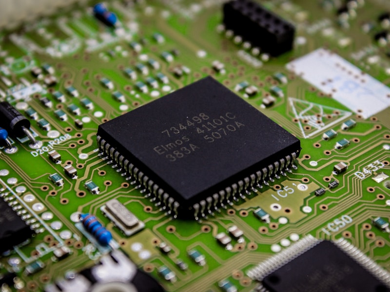 Microchip circuit board close-up showing processor and components