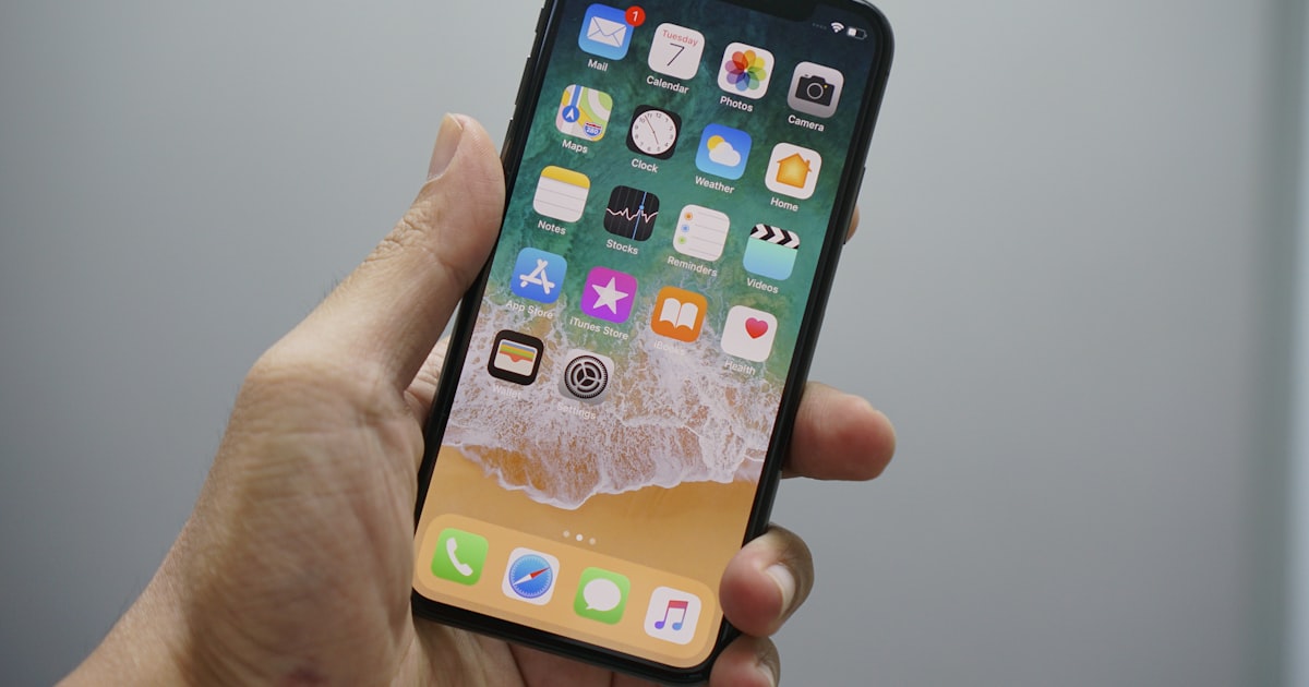 Latest smartphone models displayed on a retail counter with price tags visible