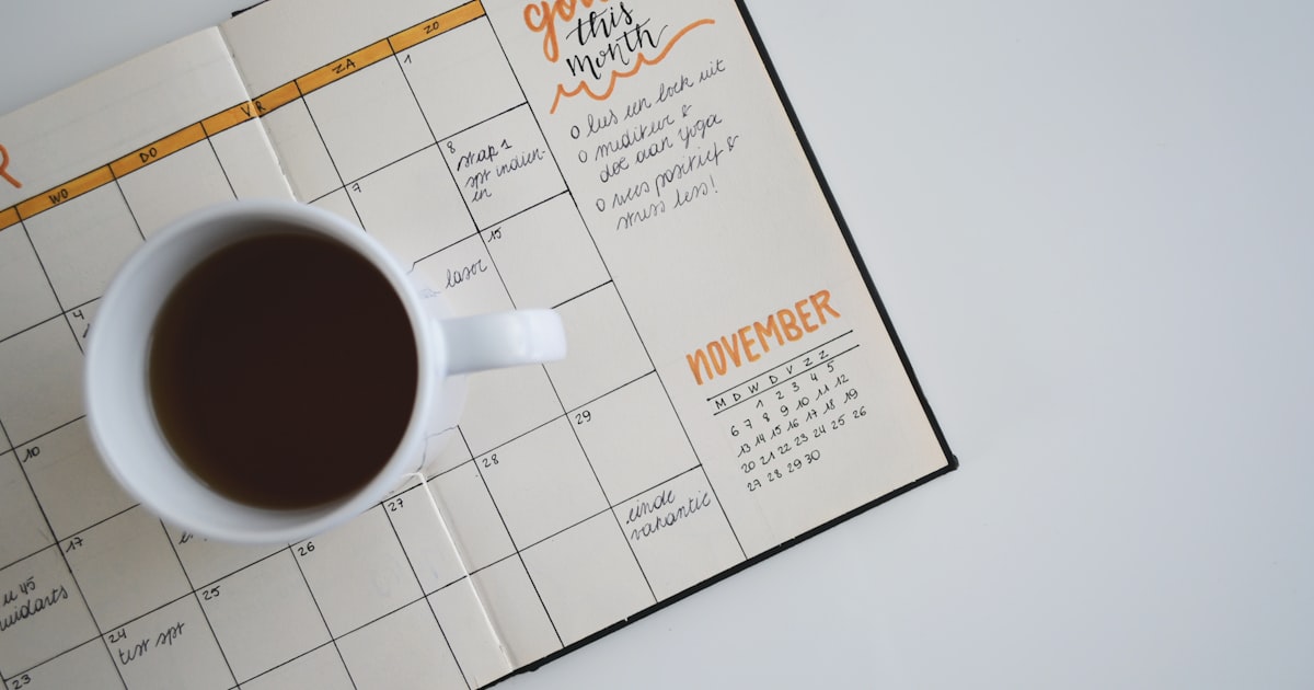 Person editing a content calendar on a laptop with Google Sheets open