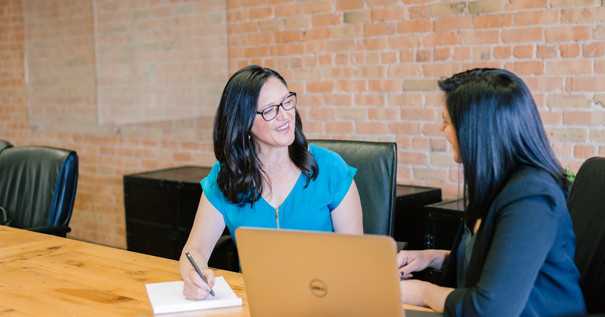 Email marketing campaign being composed on a laptop
