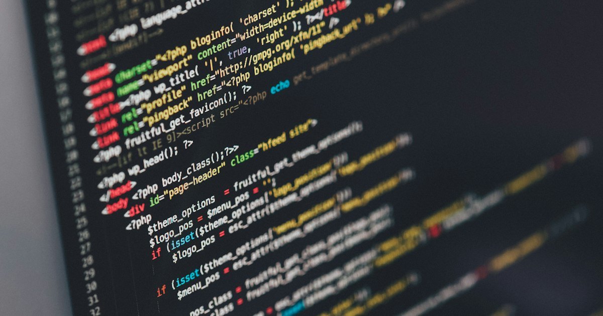 A screen displaying a code editor with syntax-highlighted lines of program code in yellow and blue